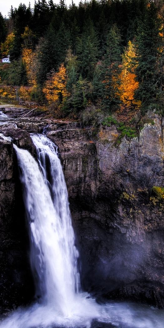 Breathtaking Autumn Waterfall in a Mountain Landscape