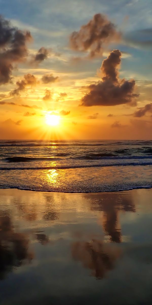 Beautiful Sunset Over the Sea with Gentle Waves