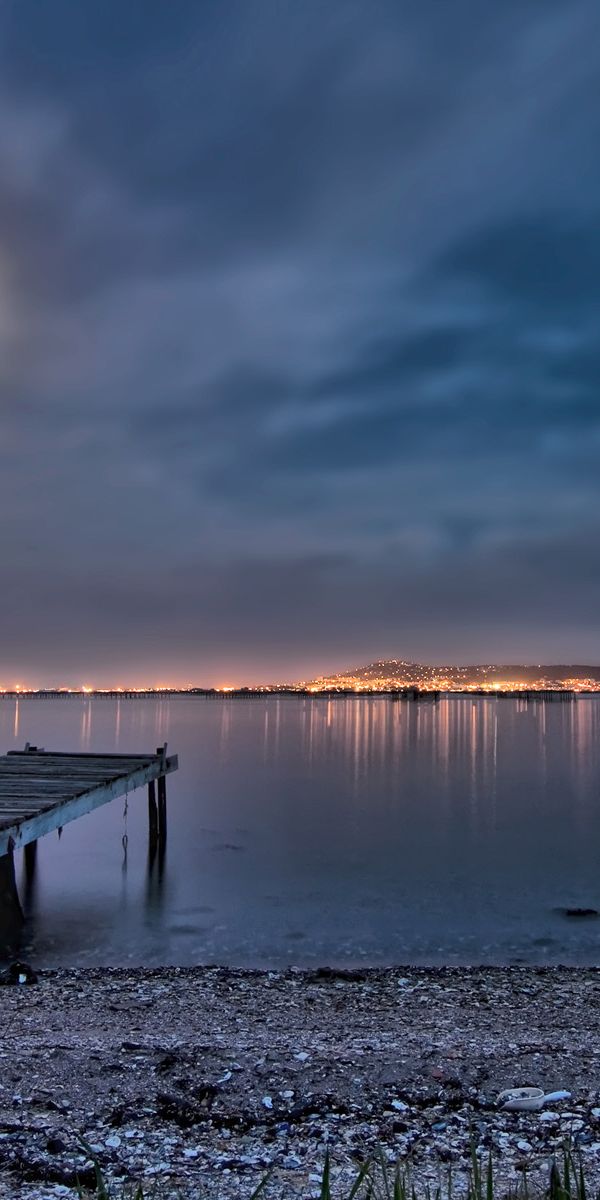 Moonlit Dock on a Tranquil Lake at Night