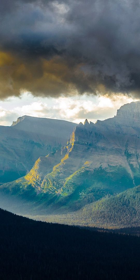 Phone wallpaper: Sunbeam, Mountains, Cliff, Forest, Mountain, Earth, Cloud, Landscape free download
