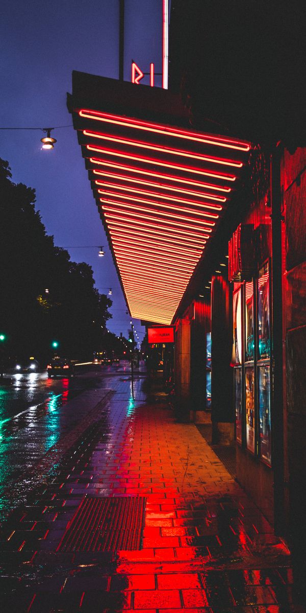 Vibrant Night Street Scene in Stockholm with City Lights