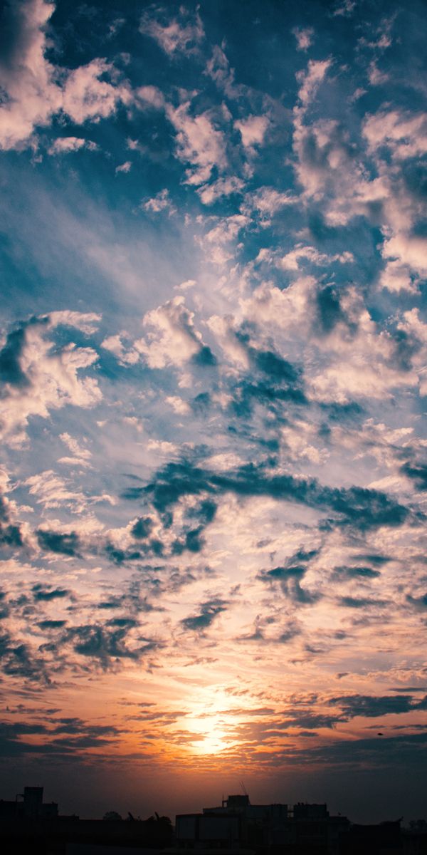 Breathtaking Sunset with Dramatic Clouds in the Sky