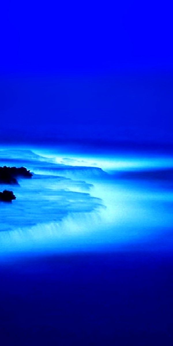 Scenic Blue Waterfall Wallpaper with a Mystical Glow