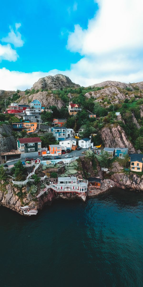Charming Coastal Village Nestled Among Rocky Mountains