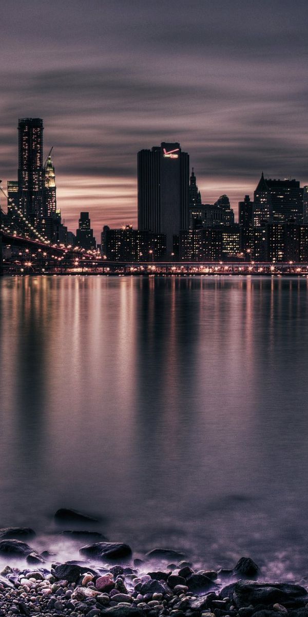Breathtaking View of Manhattan and Brooklyn Bridges at Dusk