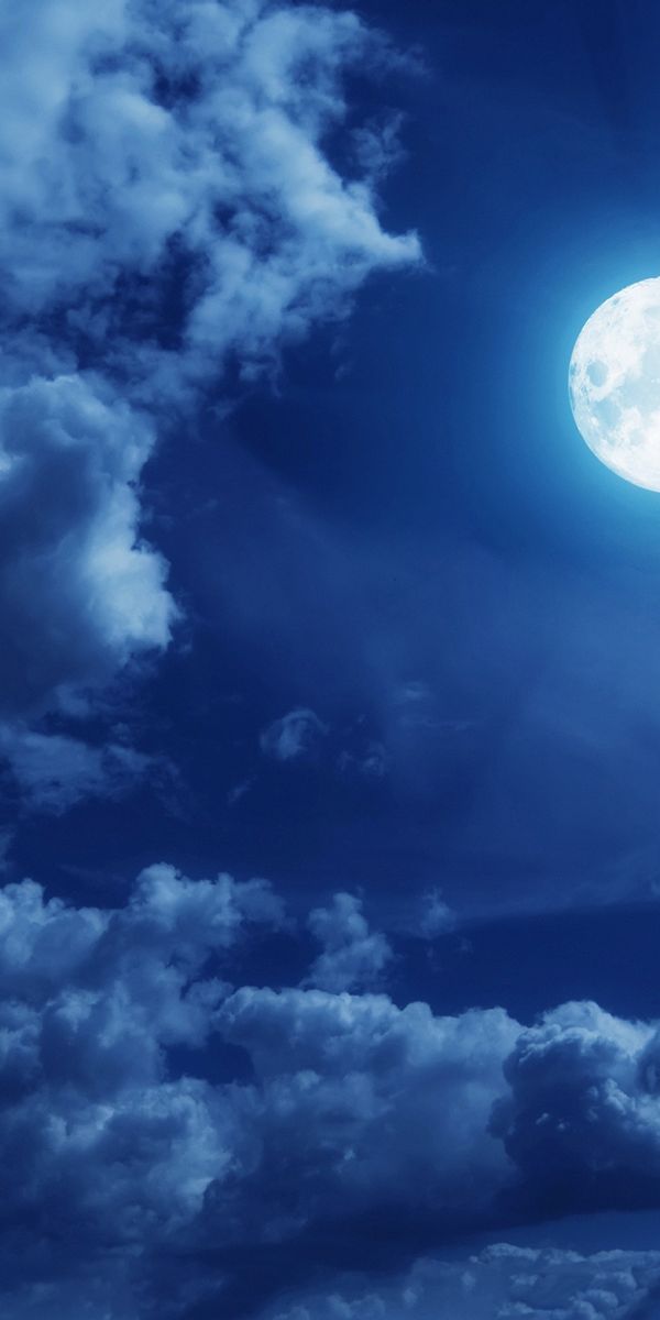 Beautiful Night Sky with Full Moon and Majestic Clouds