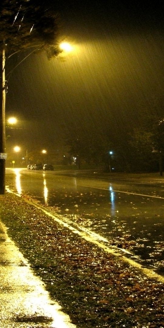Captivating Nighttime Rainy Road Scene - Free iPhone Wallpaper