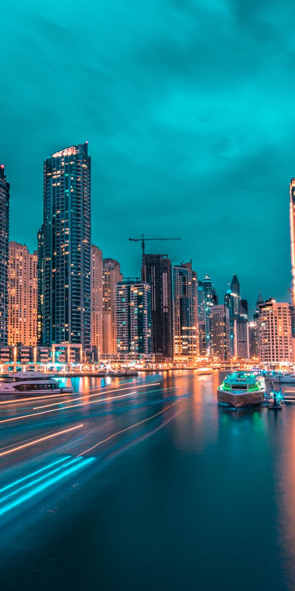 Captivating Night City Wallpaper with Skyscrapers and Port Views