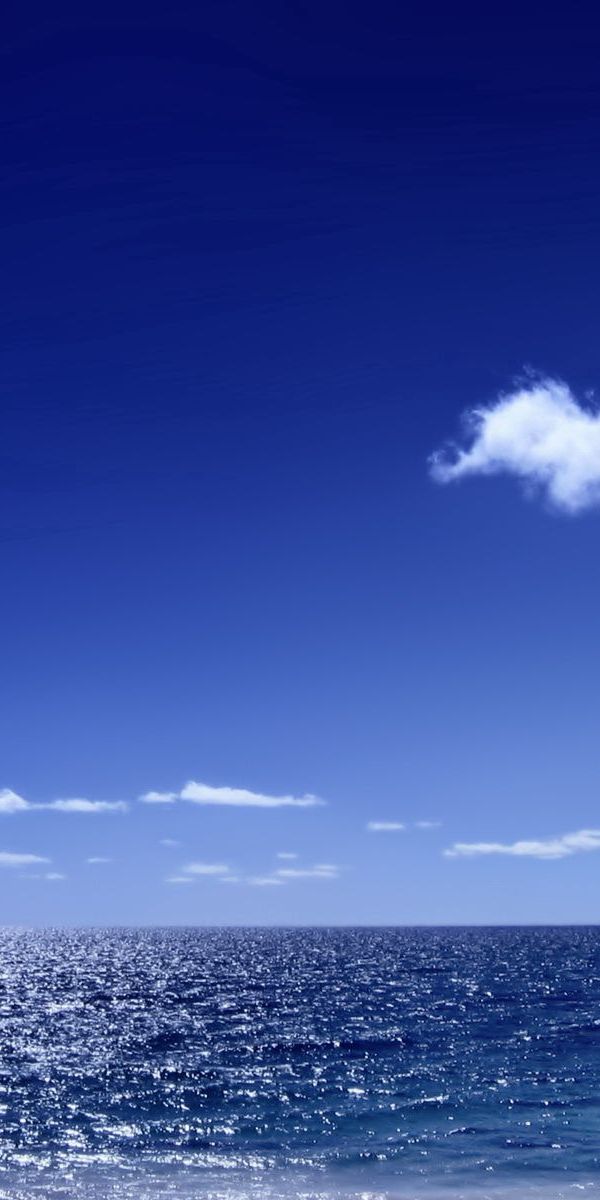 Breathtaking Blue Sea with Clouds Phone Wallpaper