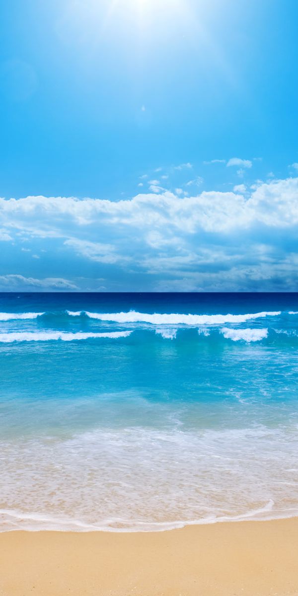 Breathtaking Ocean and Beach Scene for Your Phone Wallpaper