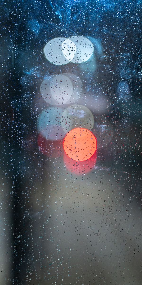 Beautiful Rainy Bokeh with Drops on Glass