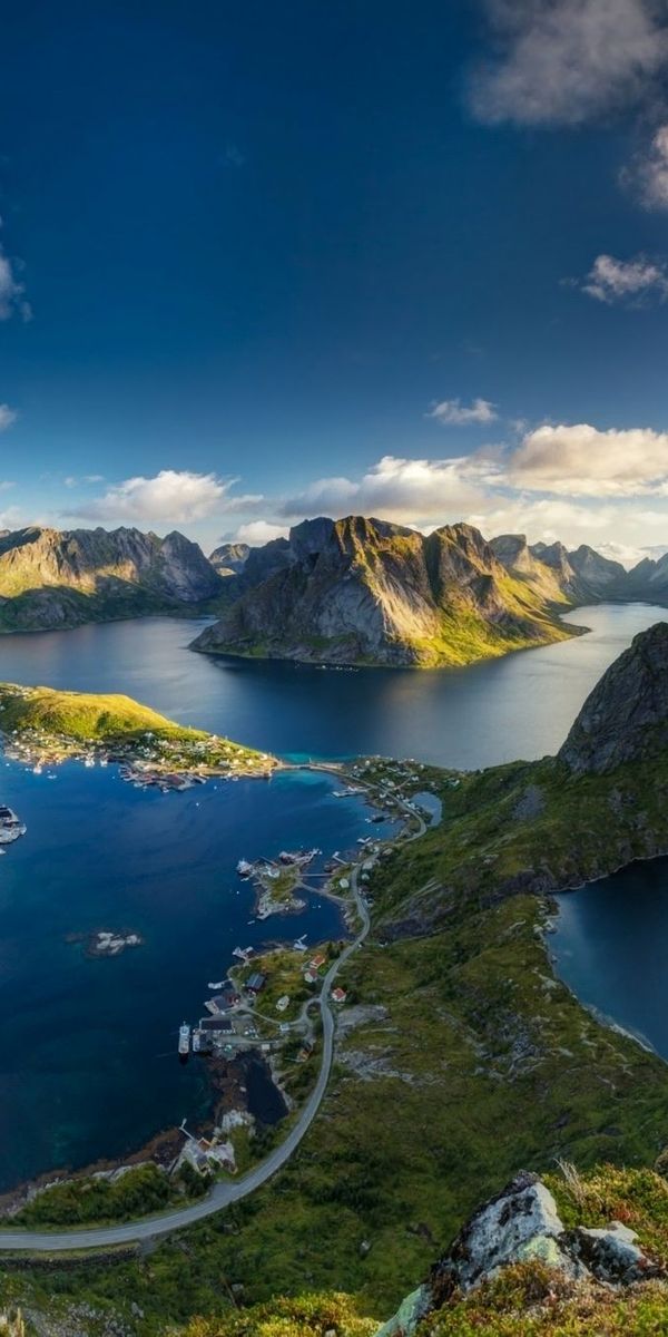 Breathtaking Coastal Village Landscape with Lake and Mountains