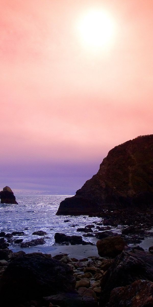 Serene Sunrise Over the Coastline: A Perfect Mobile Wallpaper