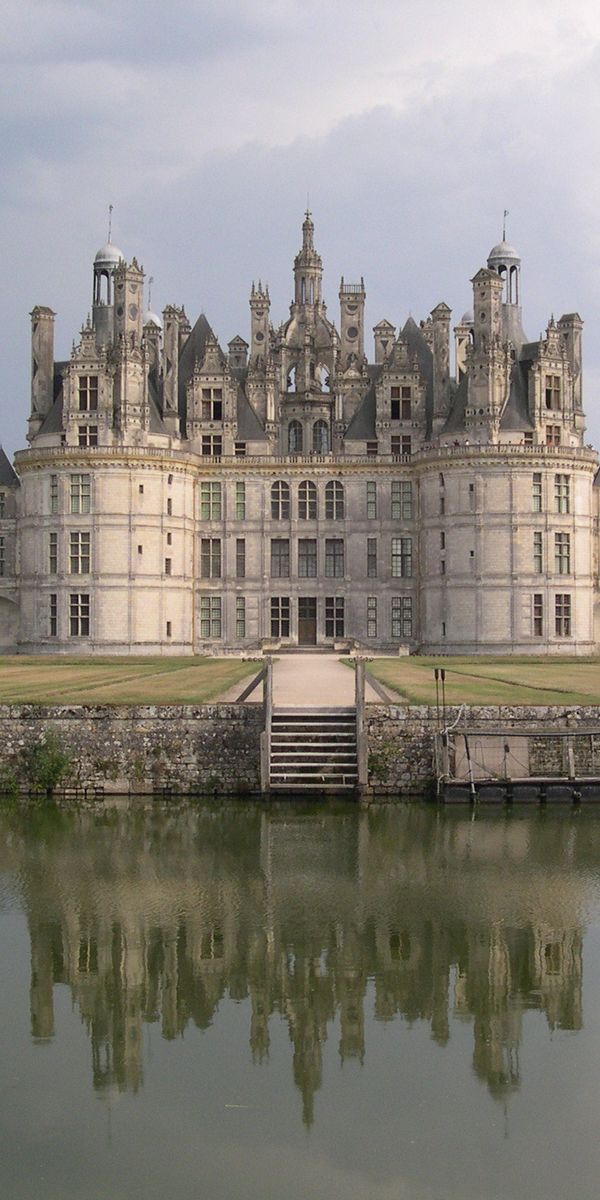 Majestic Castle Reflected in Serene Waters