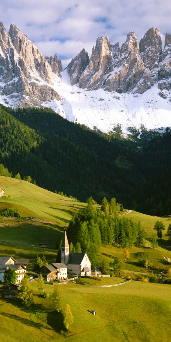 Serene Village Landscape with Majestic Mountains - HD Background