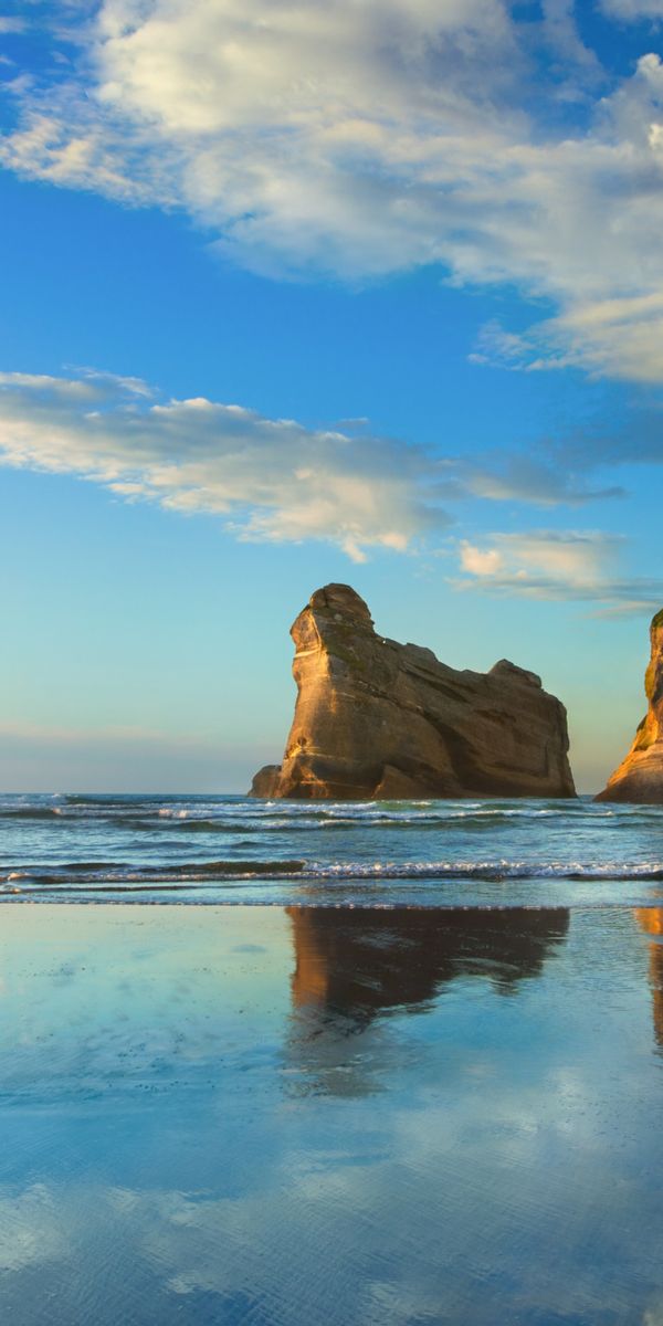 Breathtaking Beach Scene with a Runner at Sunset