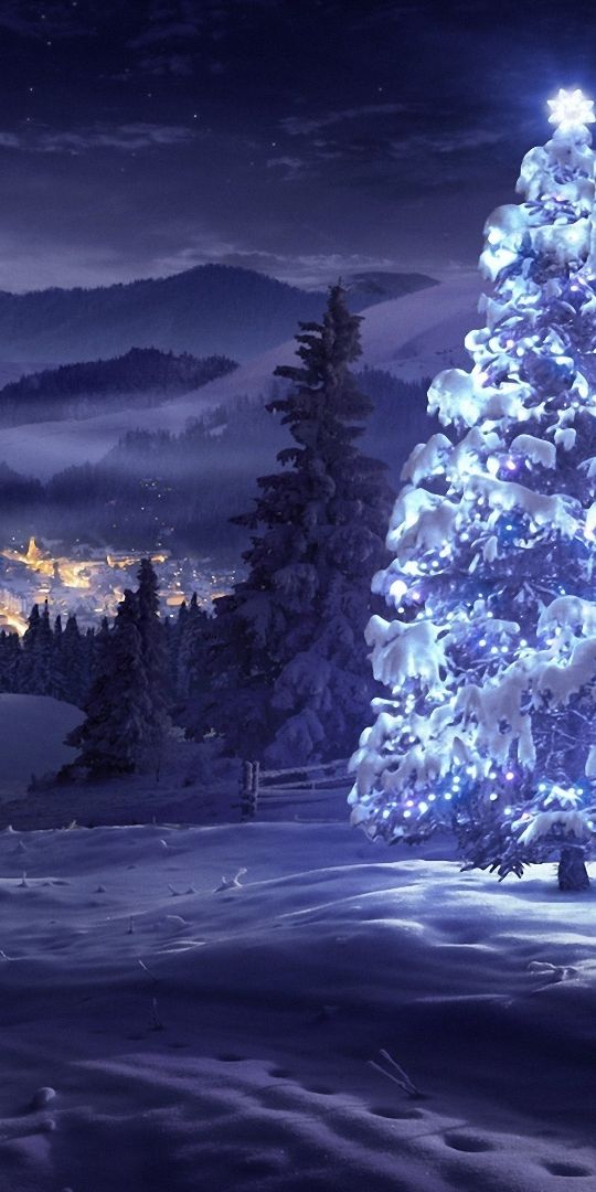 Purple Christmas Tree Surrounded by a Winter Landscape