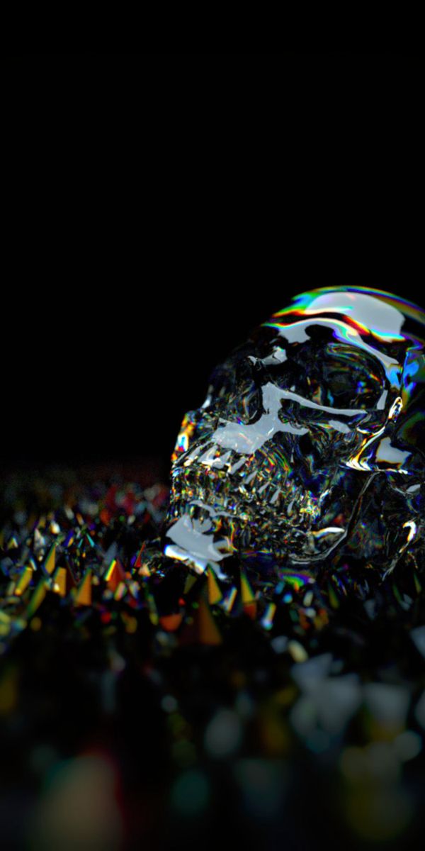 Vibrant mobile wallpaper featuring a glass skull with multicolored brilliance