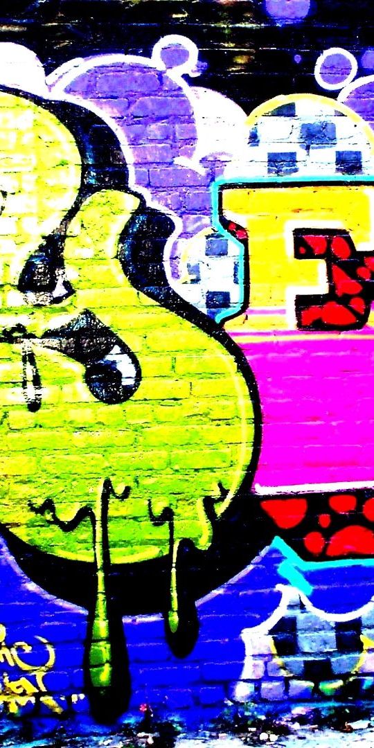 Colorful Graffiti Phone Wallpaper: A Vibrant Blend of Textures and Colors