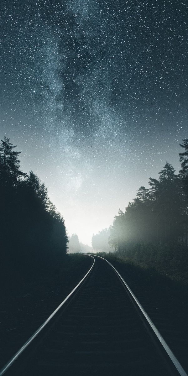 Enchanting Nighttime Railroad Scene with Starry Sky - HD Phone Wallpaper