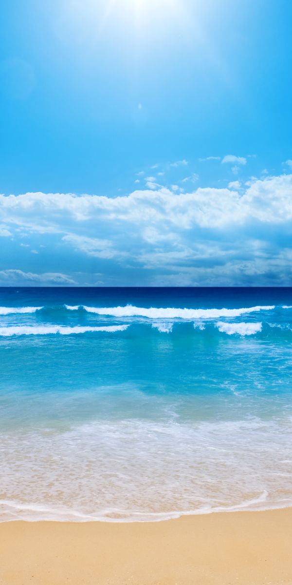 Beautiful Ocean Waves and Sandy Beach Wallpaper