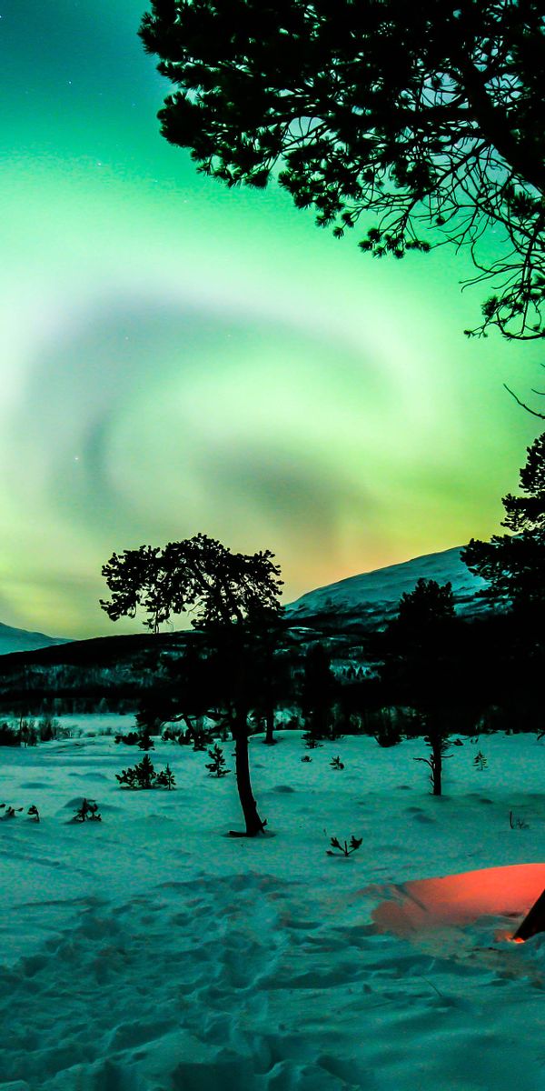 Breathtaking Winter Campsite Under the Northern Lights
