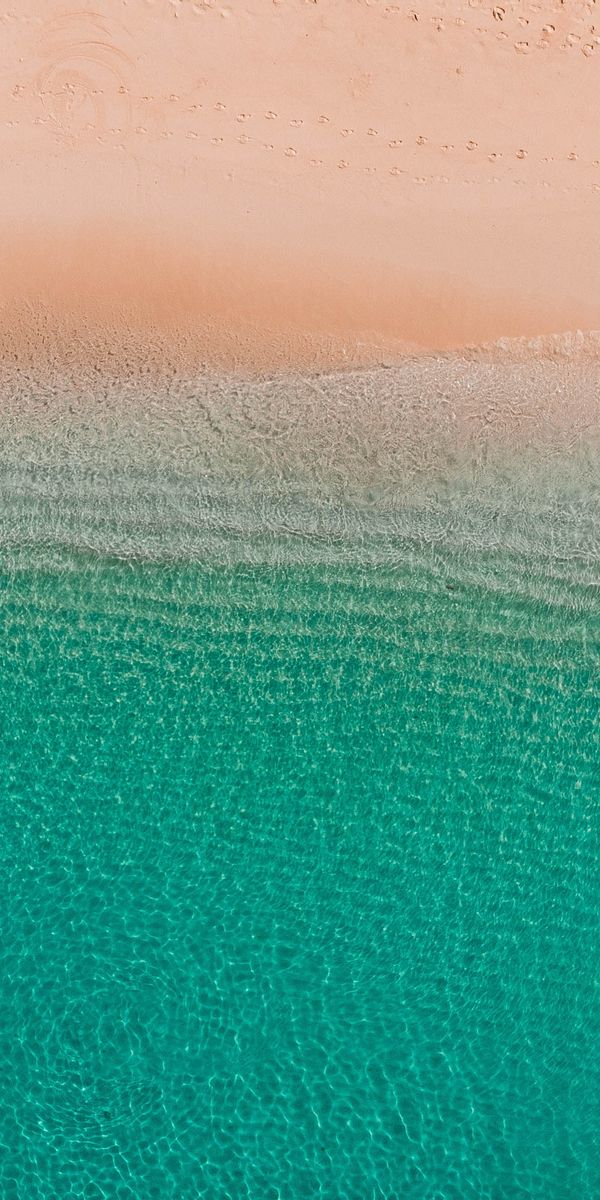 Aerial View of Beach and Crystal Clear Water