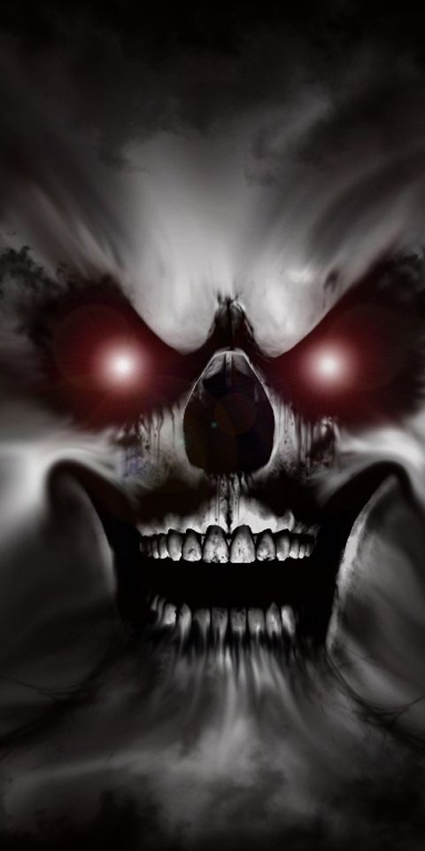 Eerie Dark Skull with Glowing Eyes Phone Wallpaper
